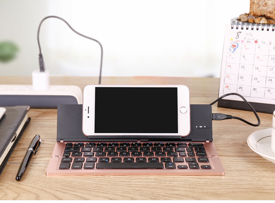 Ultra-thin folding bluetooth keyboard is suitable for Apple Android tablet mini ipad Xiaomi Huawei VIVO mobile phone universal